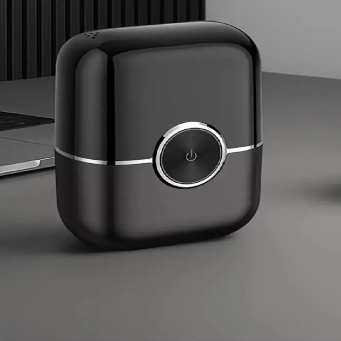 Mini rasoir électrique à aspiration magnétique