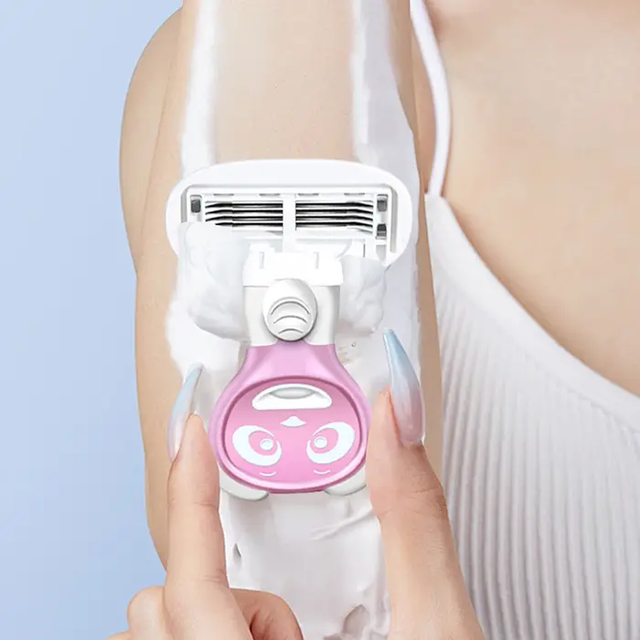 Rasoir portable pour femmes avec tête de coupe remplaçable