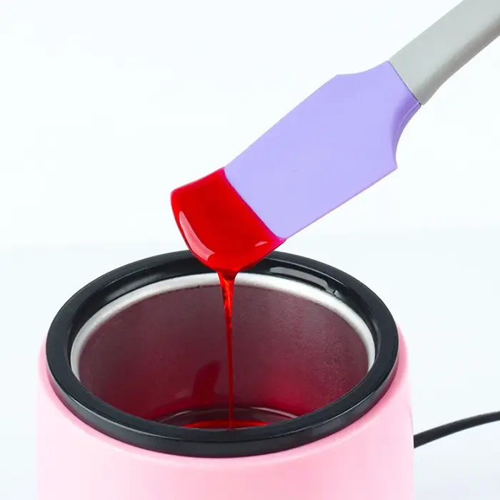 Spatule en silicone pour épilation à la cire